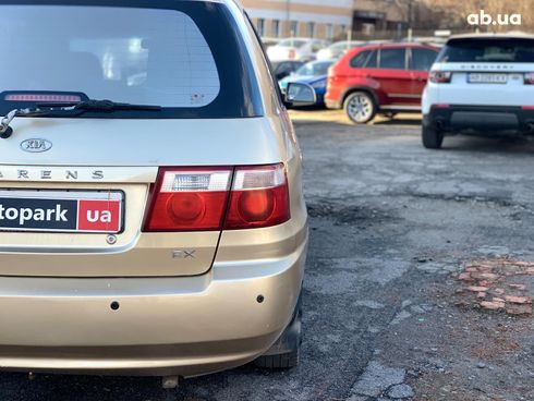 Kia Carens 2003 бежевый - фото 11