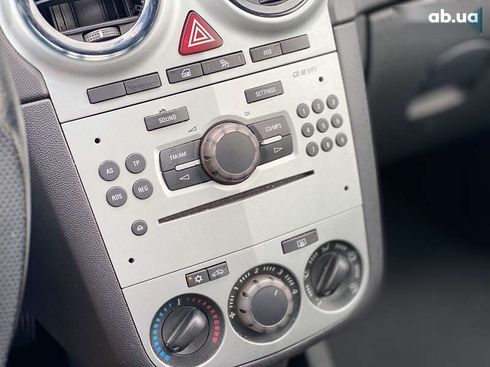 Opel Corsa 2011 - фото 13