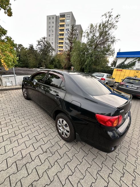 Toyota Corolla 2008 черный - фото 7