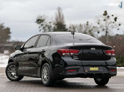 Kia Rio 2017 - фото 12
