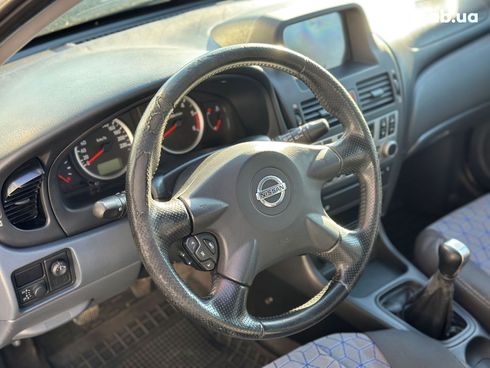 Nissan Almera 2005 черный - фото 16