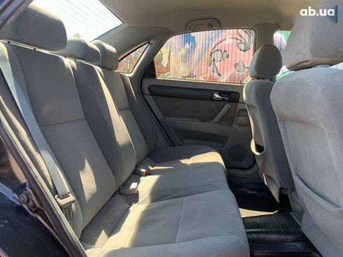 Daewoo Gentra 2014 - фото 11