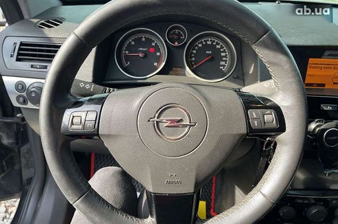 Opel Astra 2010 - фото 14