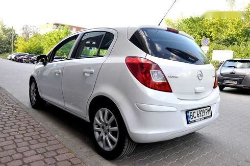 Opel Corsa 2012 - фото 13