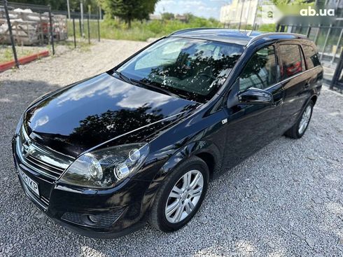 Opel Astra 2009 - фото 8