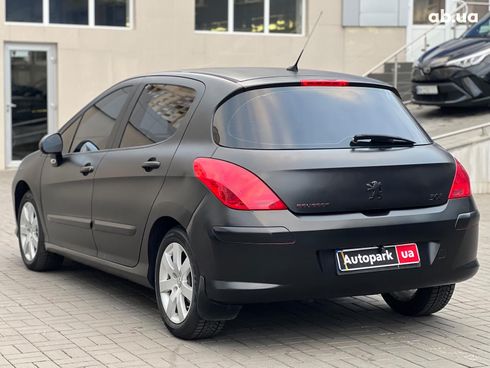 Peugeot 308 2010 черный - фото 11