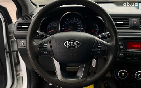 Kia Rio 2012 - фото 15