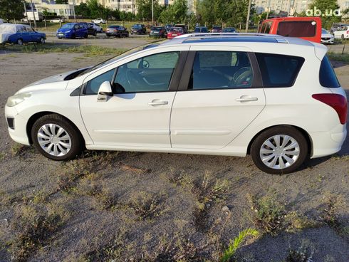 Peugeot 308 2012 белый - фото 7