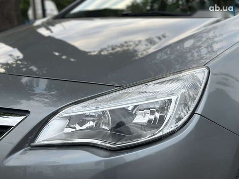 Opel Astra 2010 - фото 13