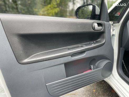 Mitsubishi Colt 2010 белый - фото 50