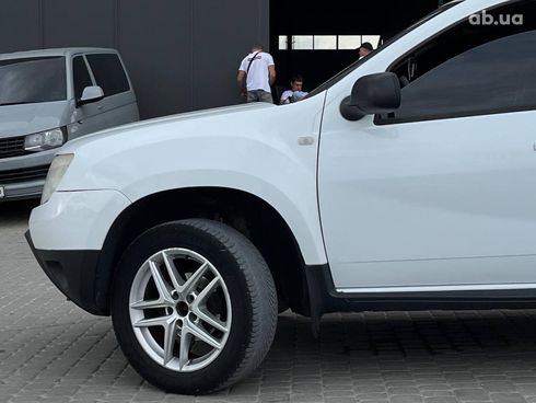 Renault Duster 2010 белый - фото 14