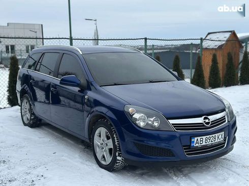Opel Astra 2010 - фото 9