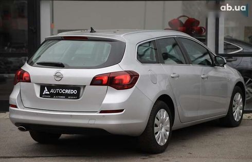 Opel Astra 2010 - фото 2