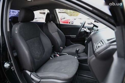 Kia Rio 2012 - фото 8