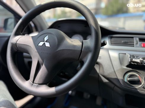 Mitsubishi Lancer 2006 синий - фото 27
