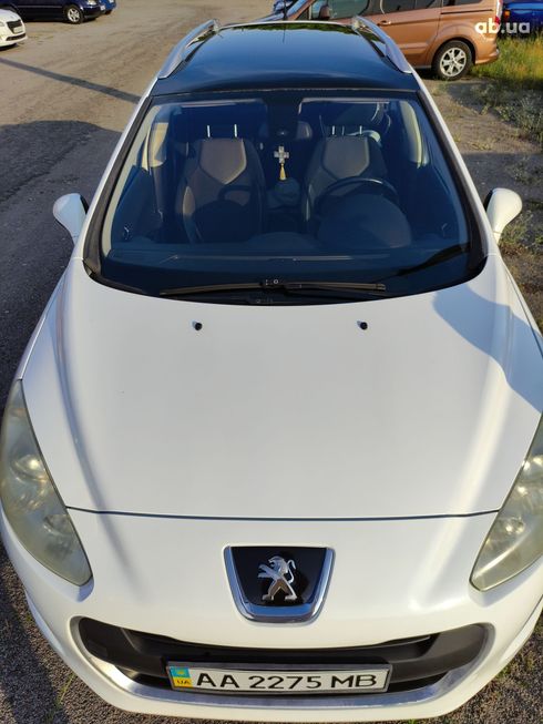 Peugeot 308 2012 белый - фото 10