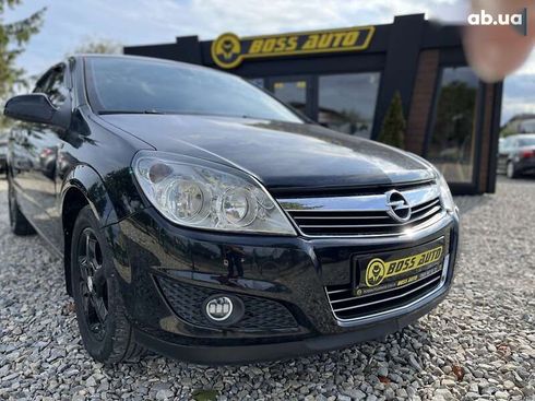 Opel Astra 2010 - фото 7