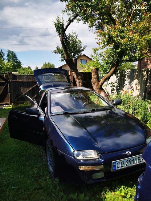 Mazda 323 1998 синий - фото 4