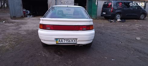Mazda 323 1990 белый - фото 3