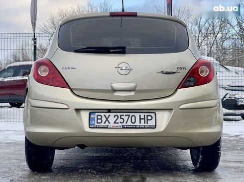 Opel Corsa 2008 - фото 20