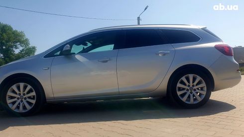 Opel Astra J 2012 серебристый - фото 8