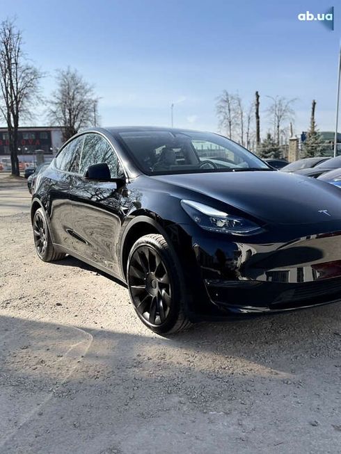 Tesla Model Y 2024 - фото 21