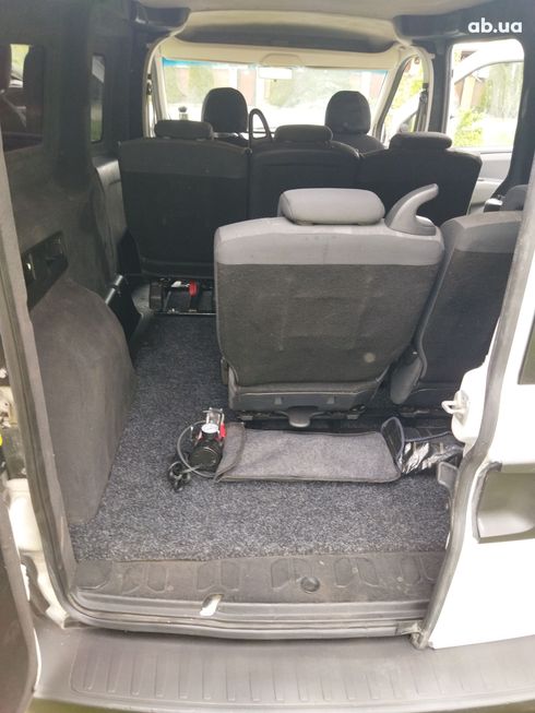 Fiat Doblo 2010 белый - фото 11