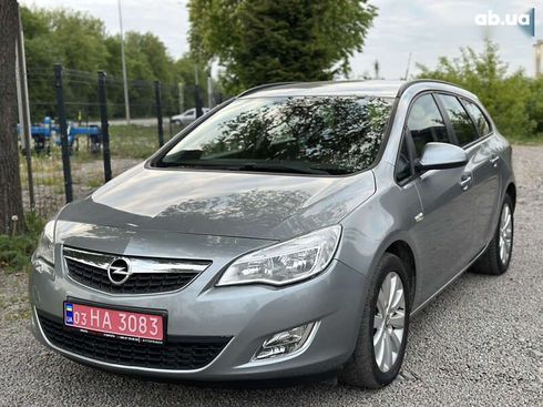 Opel Astra 2010 - фото 9