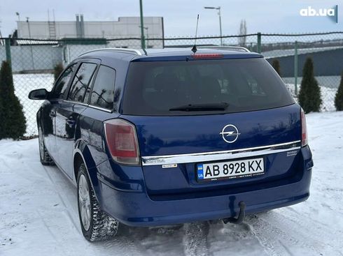 Opel Astra 2010 - фото 15