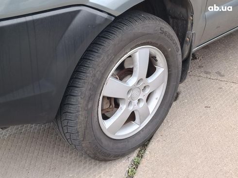 Hyundai Tucson 2012 серый - фото 4