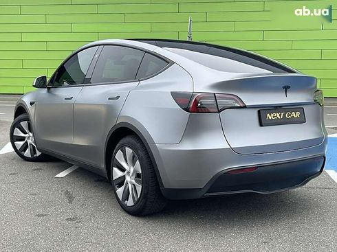 Tesla Model Y 2024 - фото 8