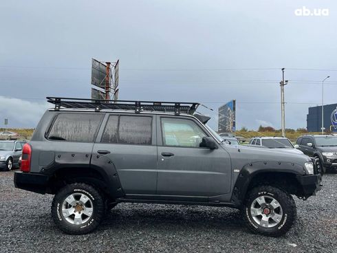 Nissan Patrol 2009 серый - фото 44