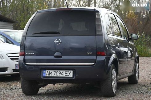 Opel Meriva 2009 - фото 12