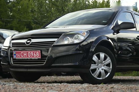 Opel Astra 2009 - фото 7