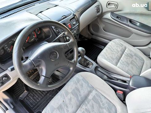 Nissan Almera 2001 - фото 30