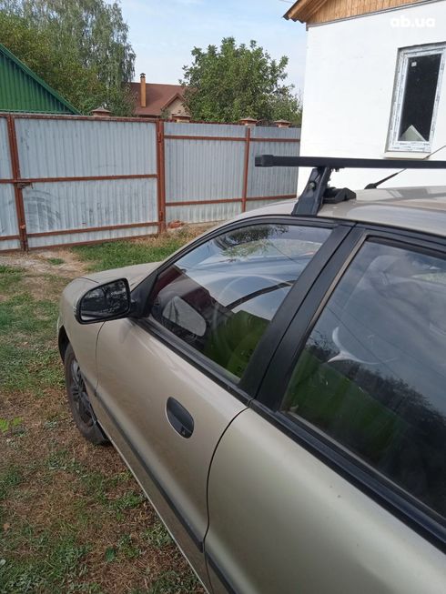 Daewoo Sens 2014 бежевый - фото 5