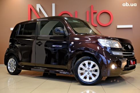 Daihatsu Materia 2009 вишневый - фото 2