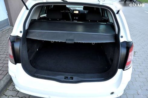 Opel Astra 2010 - фото 20