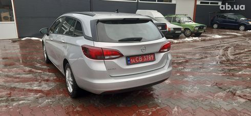 Opel Astra K Sports Tourer 2019 серебристый - фото 3