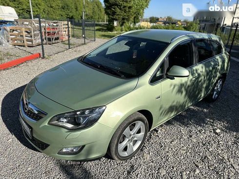 Opel Astra 2011 - фото 8