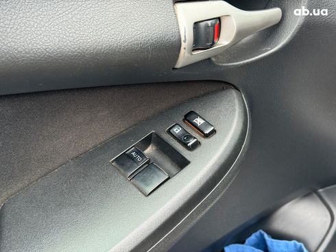Toyota Corolla 2010 серый - фото 37