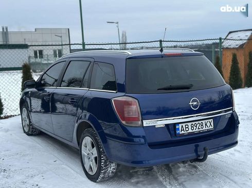 Opel Astra 2010 - фото 17