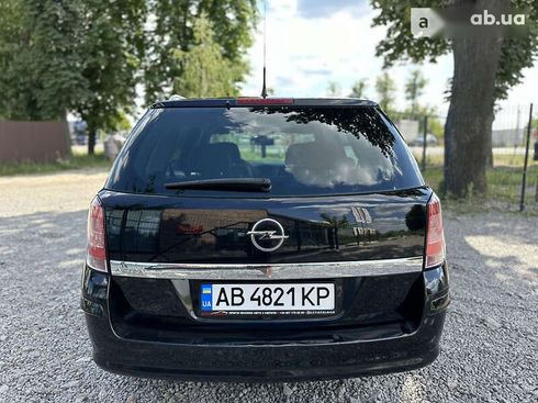 Opel Astra 2009 - фото 14