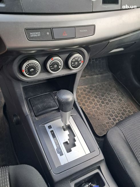 Mitsubishi Lancer 2009 синий - фото 8
