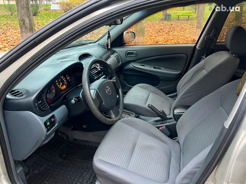 Nissan Almera 2006 бежевый - фото 11