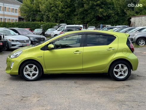 Toyota Aqua 2015 зеленый - фото 8