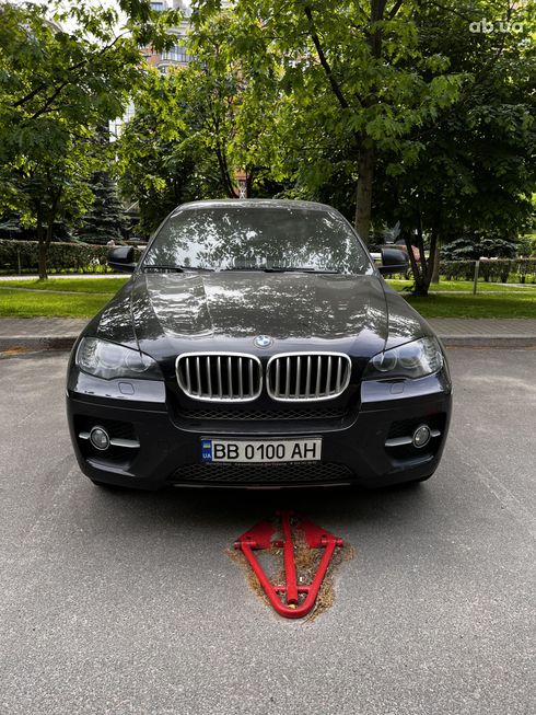 BMW 6 серия 2010 черный - фото 1