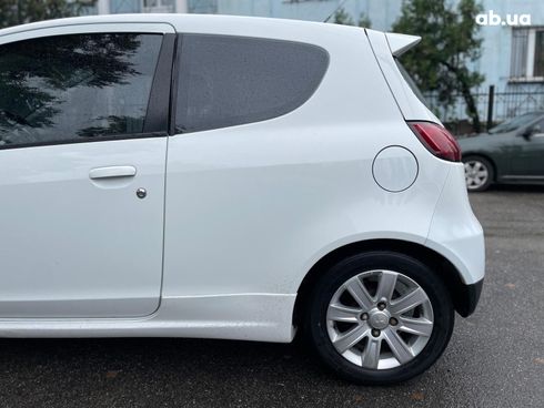 Mitsubishi Colt 2010 белый - фото 14