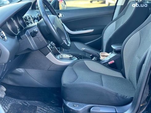 Peugeot 308 2011 черный - фото 7