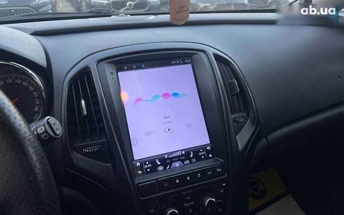 Opel Astra 2014 - фото 15